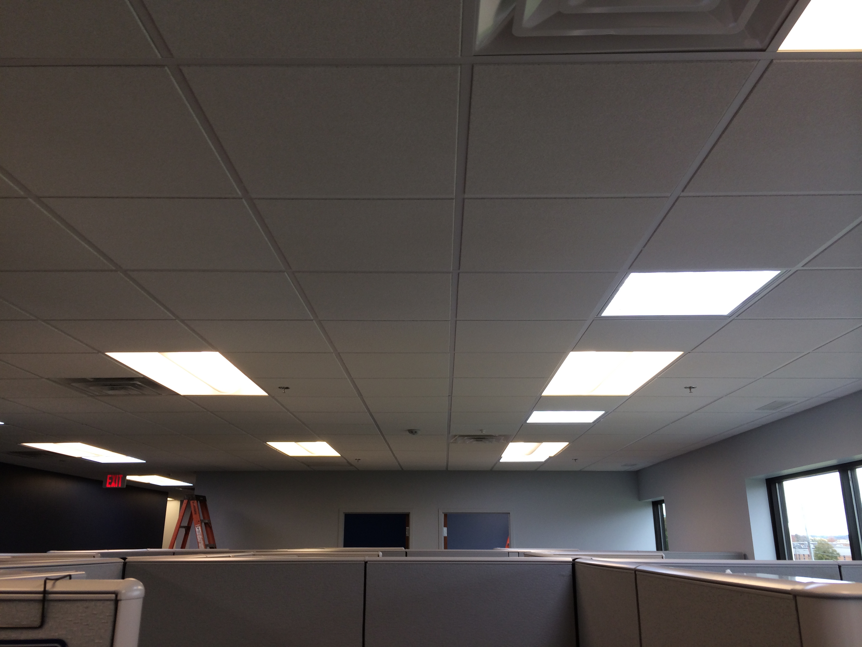 Work area with dimmable flourescent lights and tubular skylights