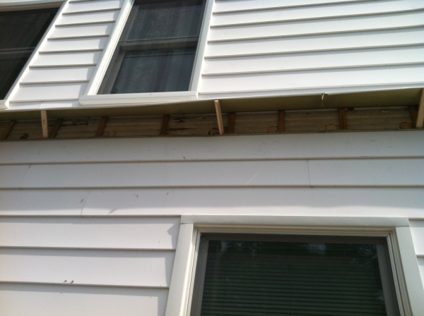 Aluminum siding wall getting blown in cellulose insulation