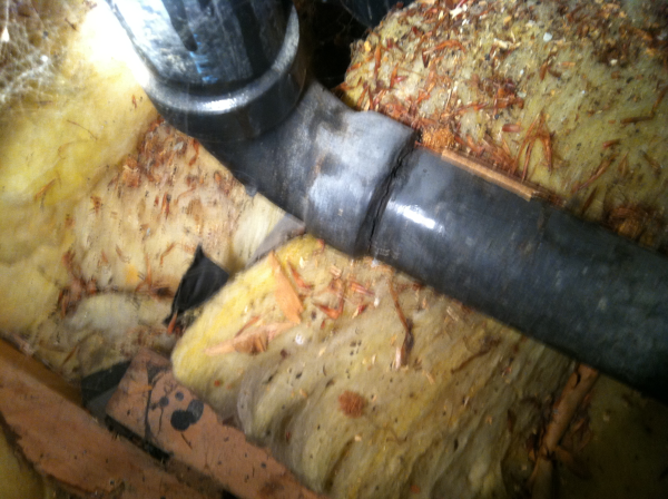 There is a crack in the plumbing line at the lower part of the elbow. It doesn't affect things too much.