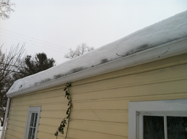 Icicles and ice dams starting to form on the detached garage of my 1835 home