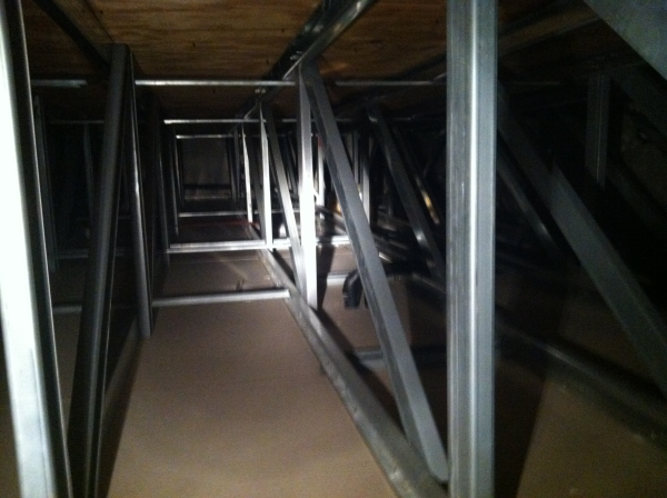 The upper attic above the drywall ceiling - this is the place to insulate