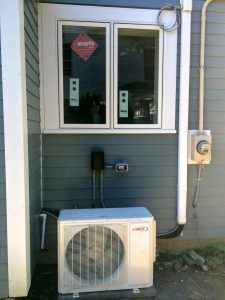Outdoor unit of a mini split heat pump at the Hiram College TREE House Deep Energy Retrofit project