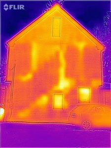 Infrared picture of 1915 case study home showing leaky stairwells